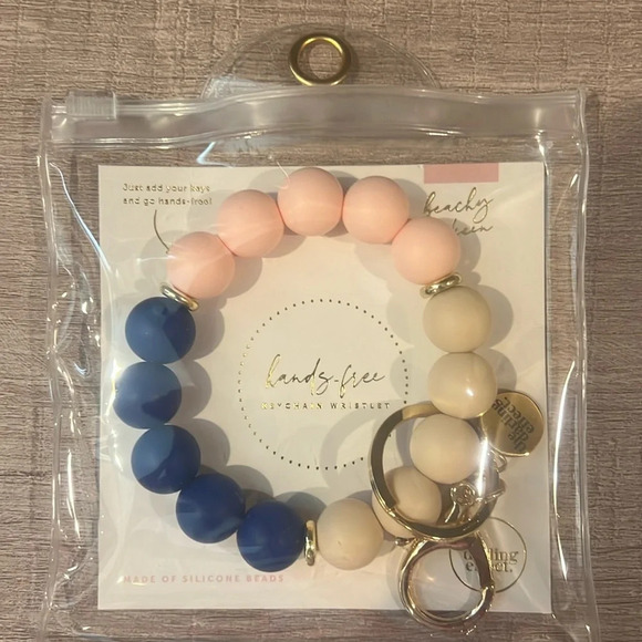 The Darling Effect Accessories - The Darling Effect Keychain Wristlet. NWT. Blue, Pink and Tan.